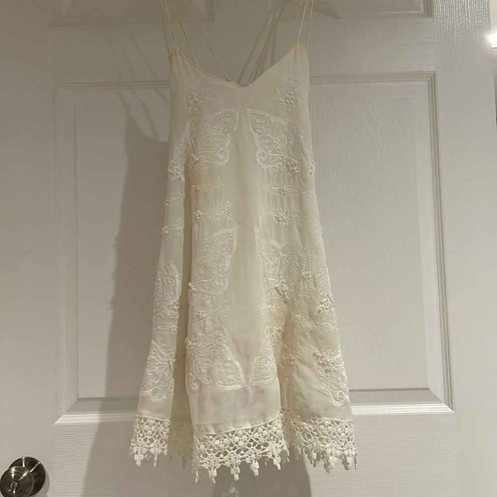 Millau S dress white small discolored spot in one area